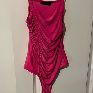 Pink scrunched on the side body suit